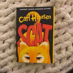 Carl Hiaasen 'Scat' Book for tweens or teens. Ages 10 and up.